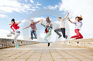 Group of teenagers jumping