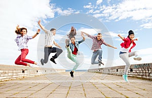 Group of teenagers jumping