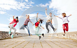 Group of teenagers jumping