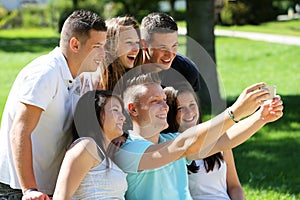 Group of teenagers and phone