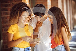 Group of teenagers on the street with CellPhones