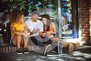 Group of teenagers on the street with CellPhones