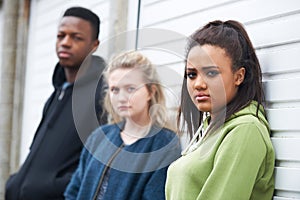 Group Of Teenagers In Urban Environment photo