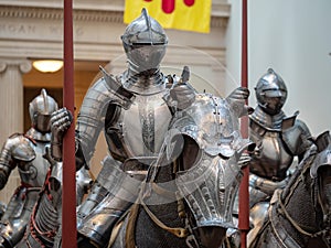 Group of 16th century knights wearing German plate armor around