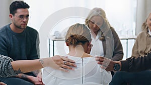 Group therapy, meeting and counseling with people in support to console a woman patient during a session for health