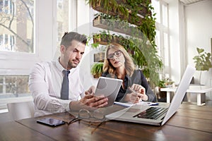 Group of thinking business people working together in the office