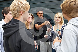 Group Of Threatening Teenagers Hanging Out photo