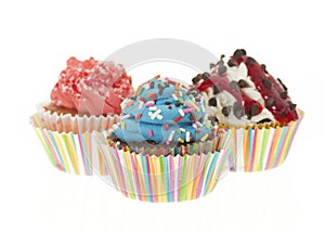 Group of three Colorful Cupcakes Isolated