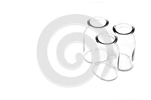 Group of three empty glass bottles