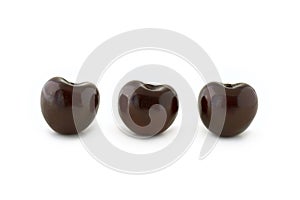 Group of three red cherries