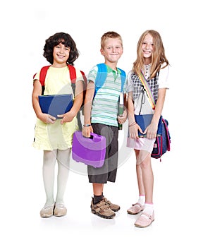 Group of three school children