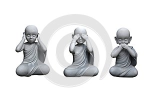 A group of three small wise monk statues isolated on white