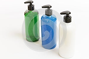 Group three soap dispensers