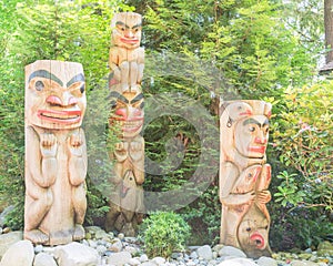 Indian totem poles in Capilano Suspension Bridge in Vancouver, C