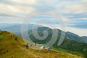 Group of tourist on top of a mountain at Doi Mon Jong, a popular mountain near Chiang Mai