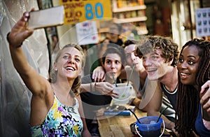 A group of tourists enjoying bucket drinks in Khao San Roa, Bang photo