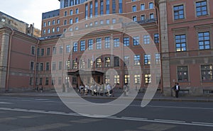 Group of tourists at the Vvedensky Hotel on Bolshoy Prospect Petrogradskaya side in St. Petersburg