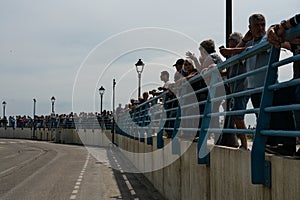 A group of tourists are waiting near the street