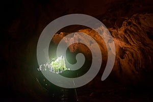 Group of tourists in the the wind cave at Gunung Mulu national park. Sarawak.