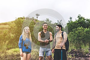 Group of traveler friends walking together at rainforest,Enjoying backpacking concept