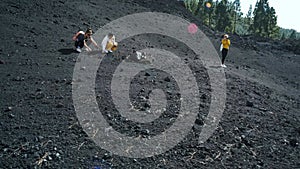 Group travelers around Chinyero volcano in the Teide national park on the island of Tenerife. Go Everywhere. Surface of