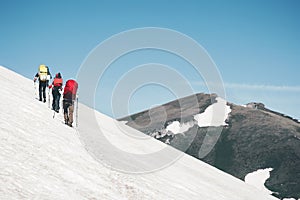 Group Travelers hiking in mountains glacier