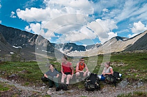 Group of travelers in mountains