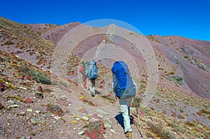 Group trekkers running on the road against Leh