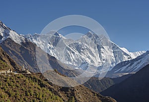 Group of trekkers, stupa, Everest and Lhotse