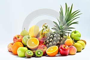 Group of tropical ripe fruits on white background