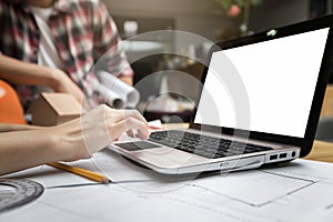 Group of two coworkers working with laptop in office. co-working teamwork concept