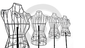 Group of tylish wire tailor's mannequin isolated on white