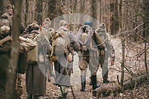 Group of unidentified re-enactors dressed as photo