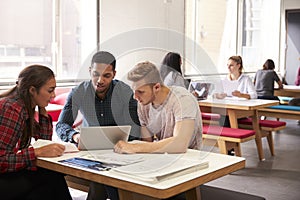 Group Of University Students Working In Study Room photo