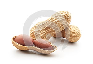 Group of unpeeled and opened shell peanuts photo