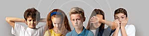 Group Of Upset Scared Kids Posing Isolated Over Grey Background
