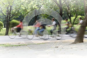 Group of urban people cycling in park for good health
