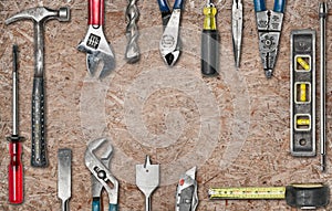 Group of used tools on wood