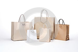 group of various sized paper bags on white background