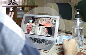 Group videocall and chat via computer laptop at home