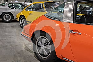 Group of Vintage Colorful Porsche 911 Collector Cars on Exhibition Produced in 1973