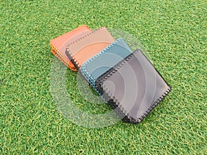 Group Wallets on grass
