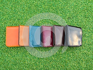 Group Wallets on grass