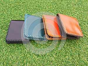 Group Wallets on grass