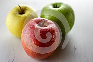 Group of wet apples isolated