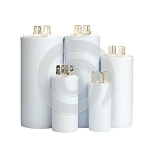 Group white electrolytic capacitors in row isolated on white background