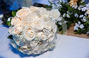 Group of white roses, wedding decorations.