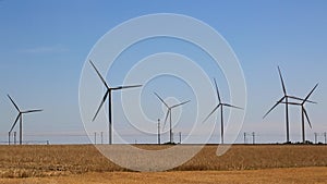 Group of Wind Turbines in a Field