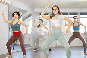 Group of women dancing dancehall in studio