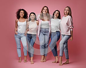 Group of women with different body types on background